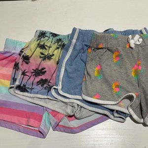 bundle of four running/playing girl shorts medium 7/8 in kids